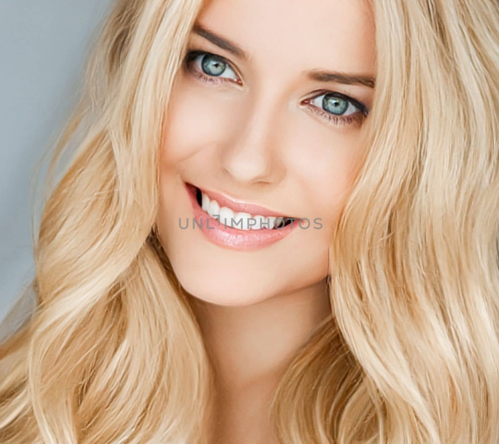 Beautiful blonde woman smiling, white teeth smile by Anneleven