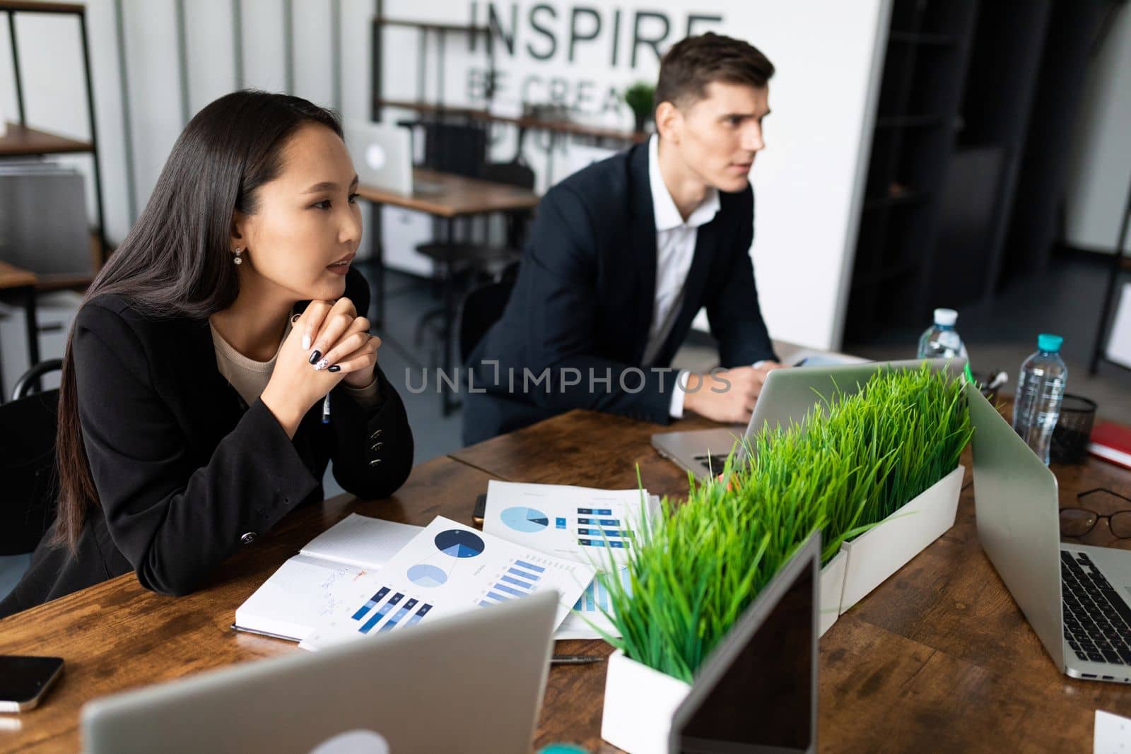 businessmen sitting at the table during negotiations in the office.