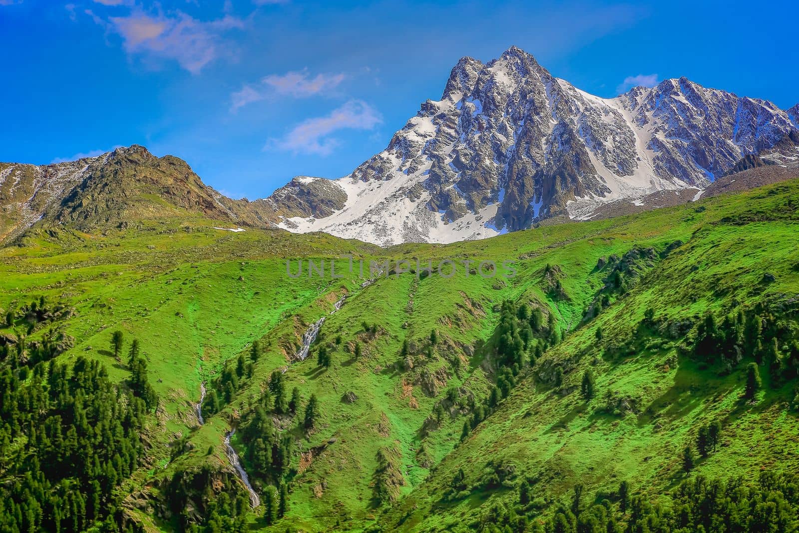 Snowcapped mountains in Kaunertal valley at springtime sunny day , Tyrol, Austria