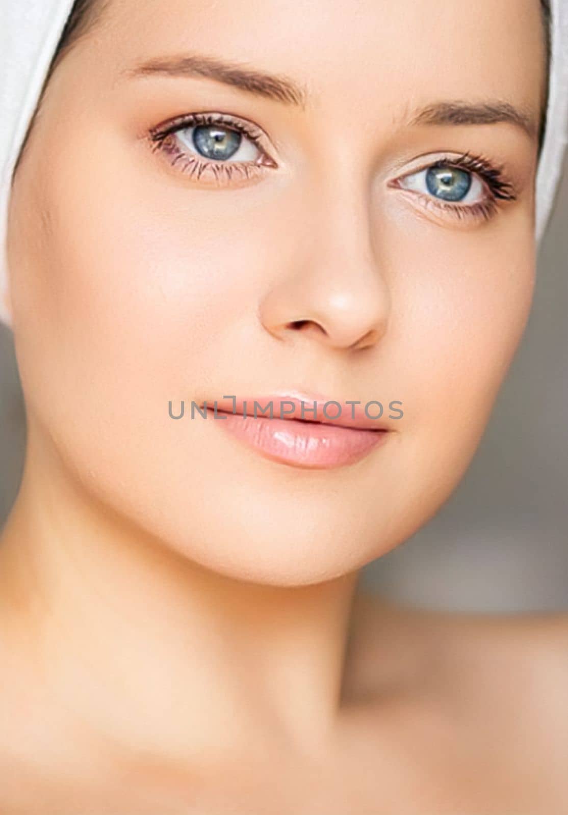 Skin care and beauty routine, beautiful woman with white towel wrapped around head, skincare cosmetics and face cosmetology by Anneleven