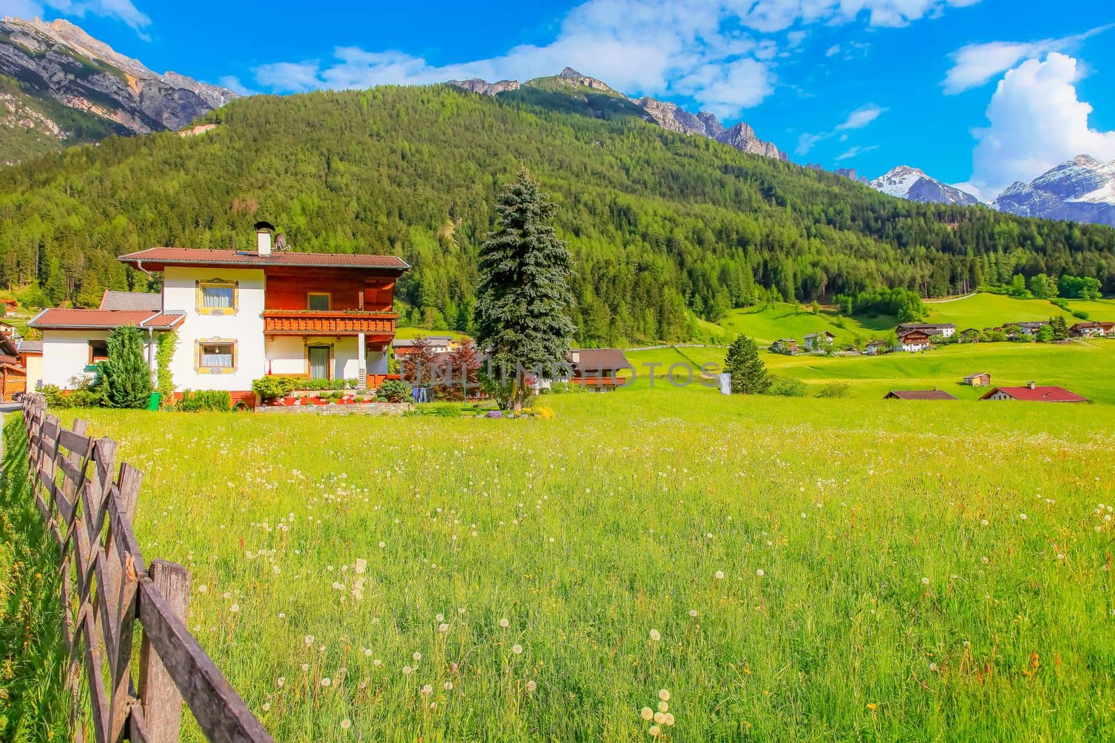 Alpine farm in Green Stubai valley near Innsbruck at sunset, Tyrol, Austria