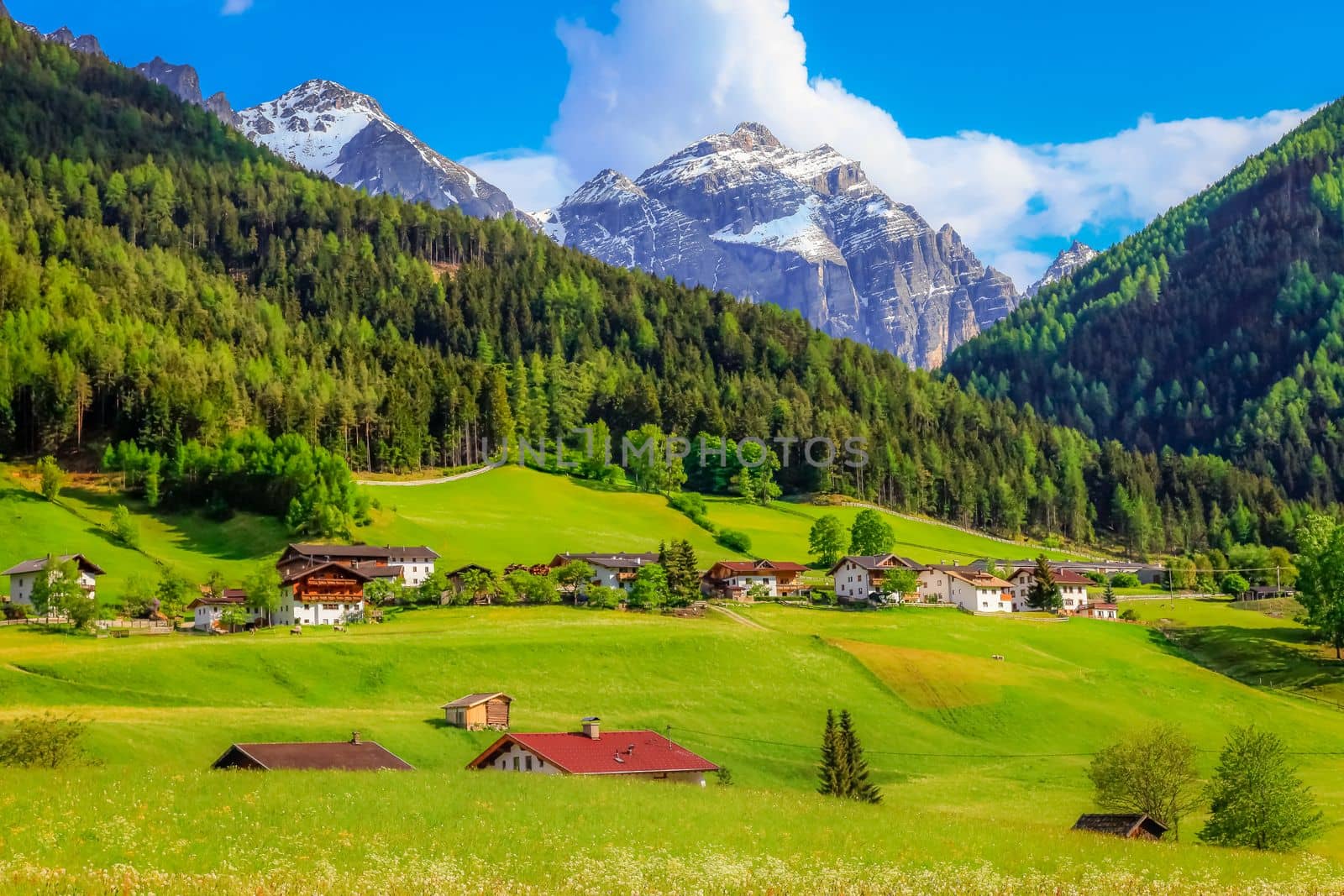 Alpine farm in Green Stubai valley near Innsbruck at sunset, Tyrol, Austria