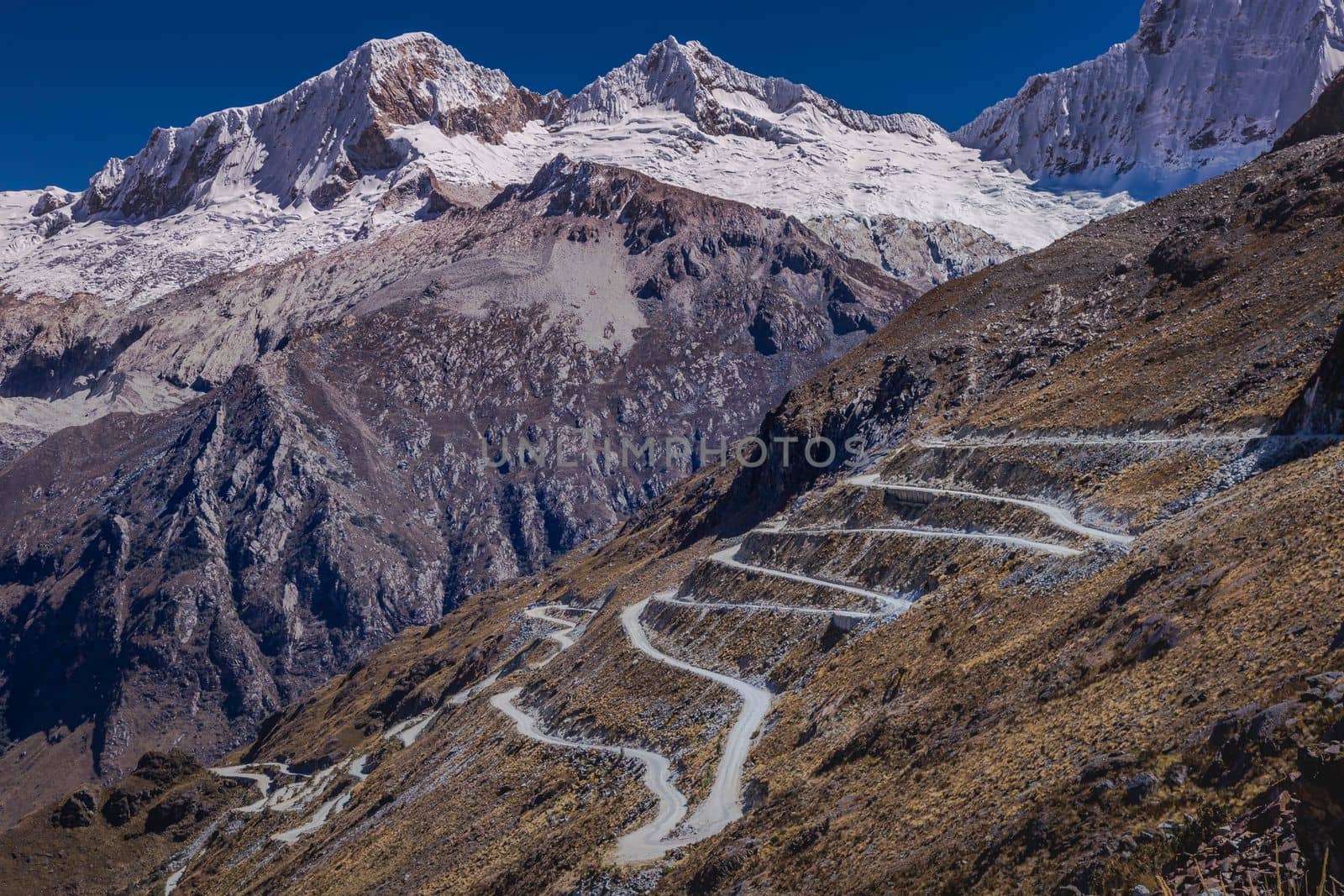 Portachuelo winding Road, mountain pass in Huascaran, Cordillera Blanca, snowcapped Andes, Ancash, Peru