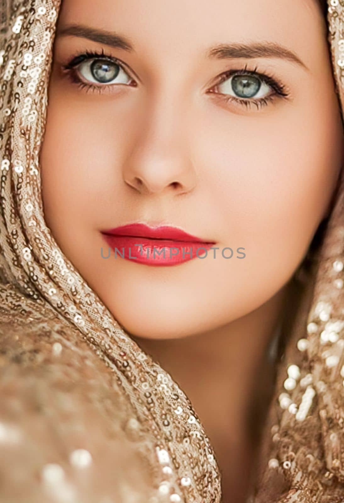 Beauty, luxury fashion and glamour, woman dressed in gold, portrait