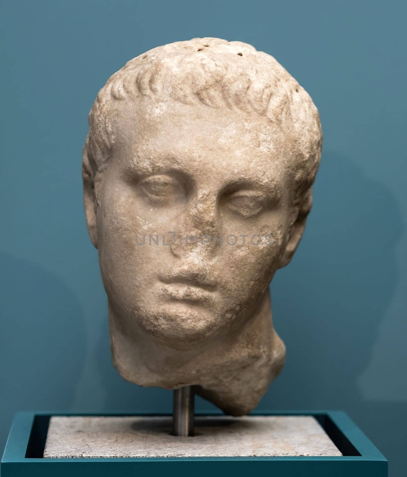 Berlin, Germany - 18 September 2019: Sculpture bust of Ptolemy III in Berlin museum. Statue head at art exhibition in Germany