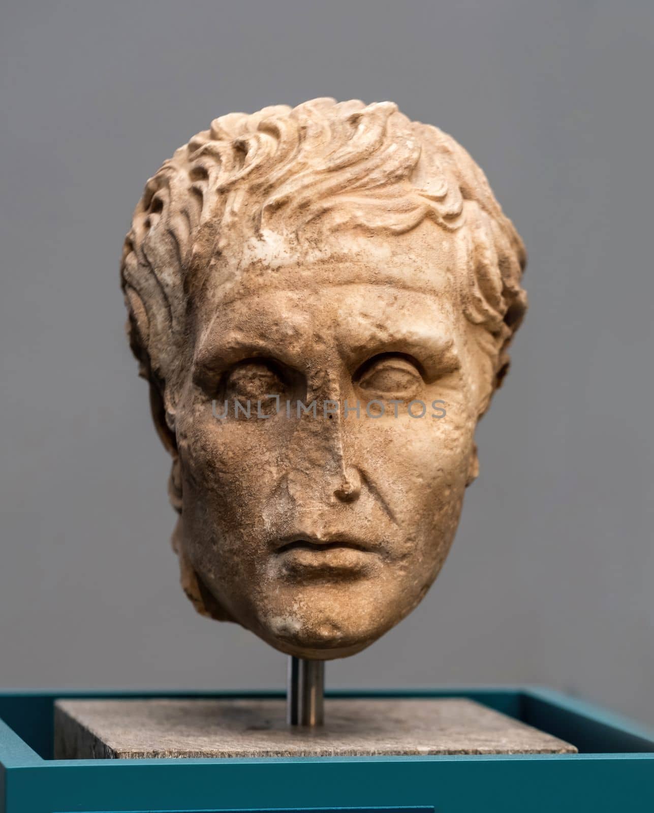 Berlin, Germany - 18 September 2019: Sculpture bust of Menander in Berlin museum. Statue head at art exhibition in Germany