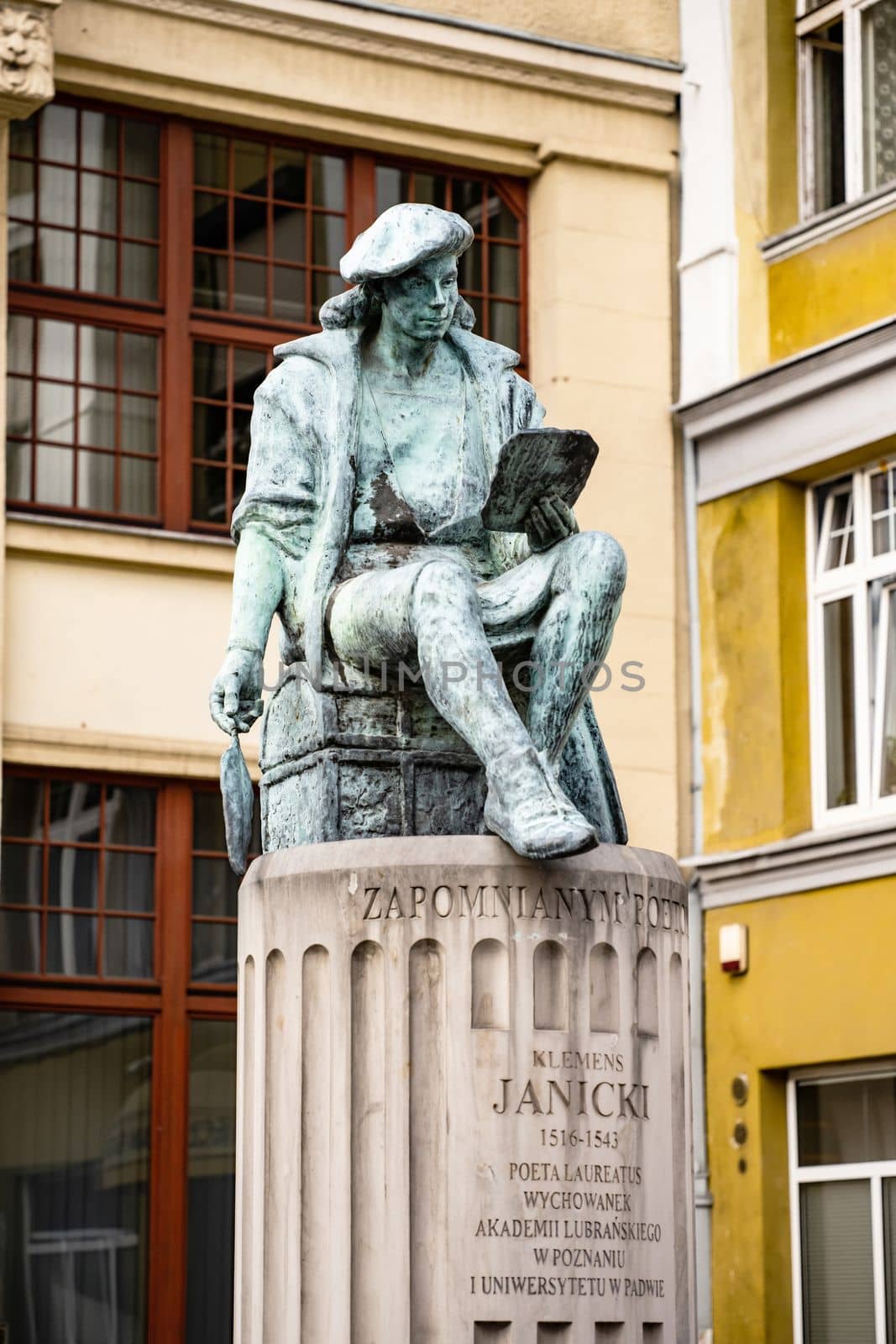 Poznan, Poland - 01 August 2022: Klemens Janicki statue monument in Poznan, Poland as memory of famous polish writer and poet. Beautiful sculpture of renaissance in Europe