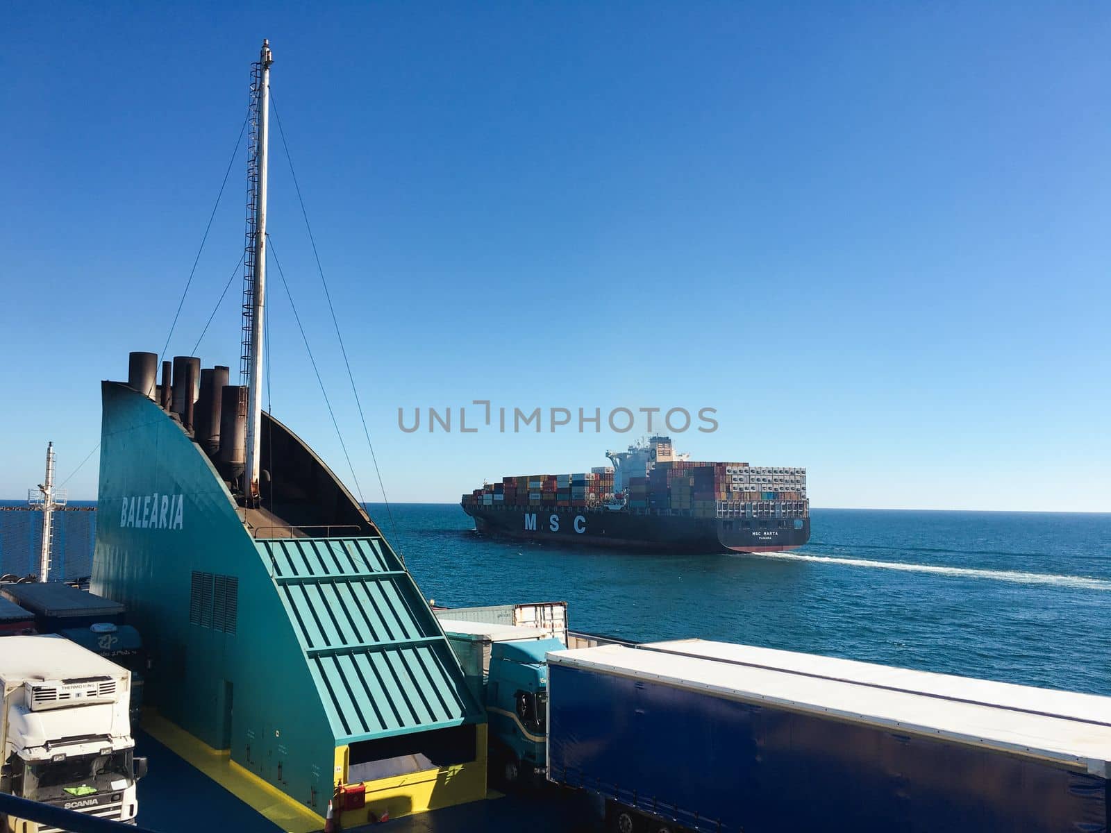 Ferry in Ibiza spain heading to barcelona with cars and passengers. High quality photo