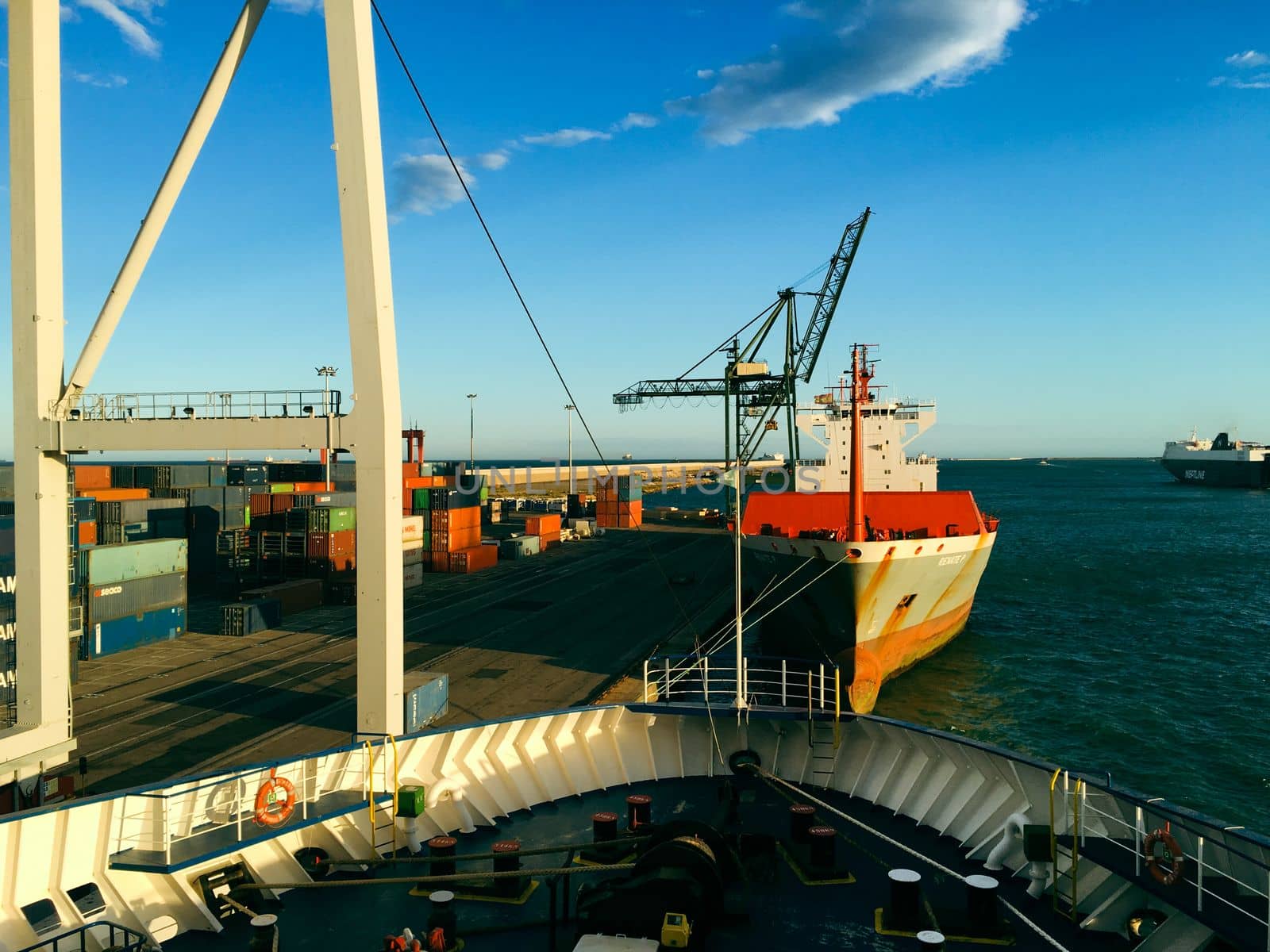 Container logistical freight cargo ships in barcelona spain europe in summer time by WeWander