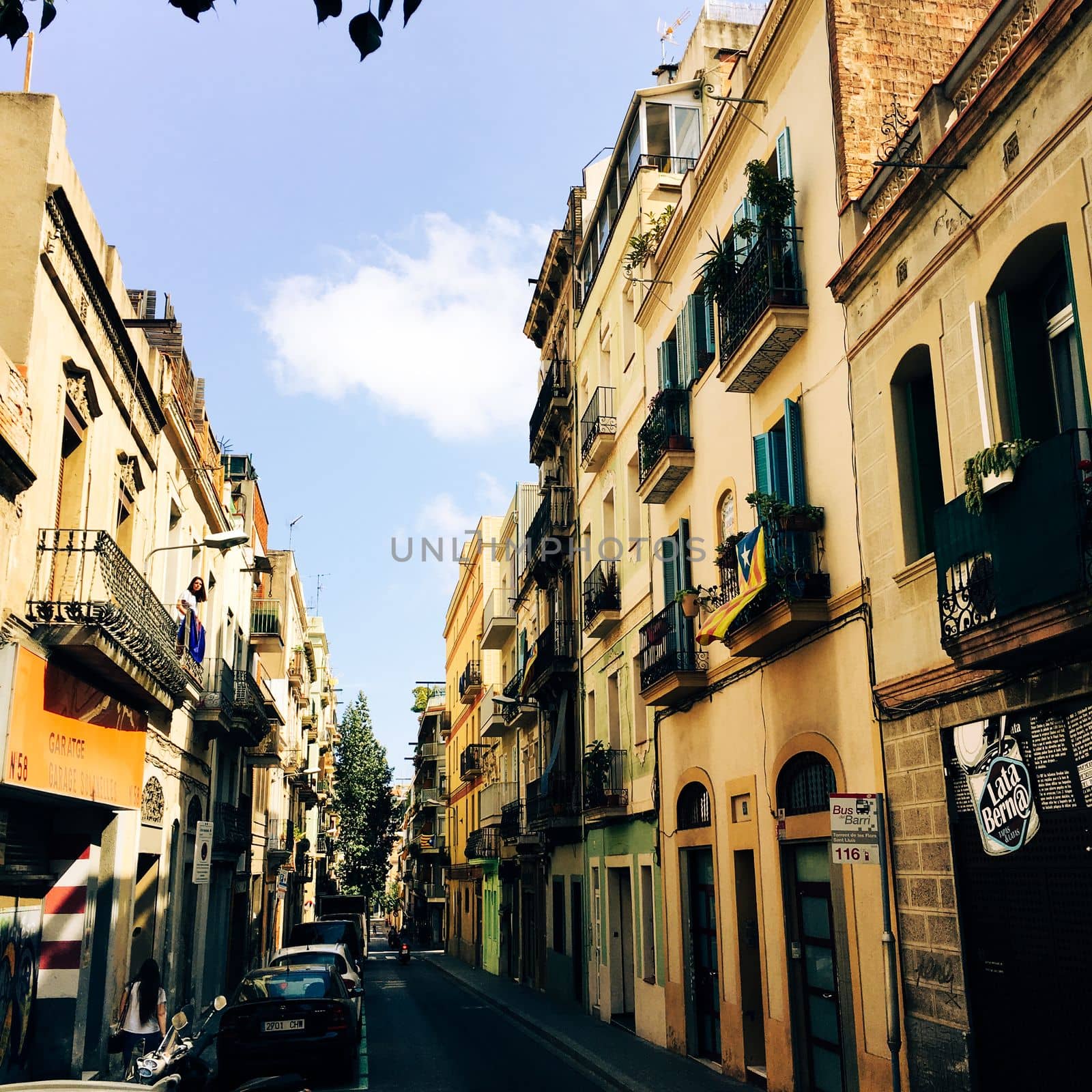City street architecture in barcelona spain in summer by WeWander