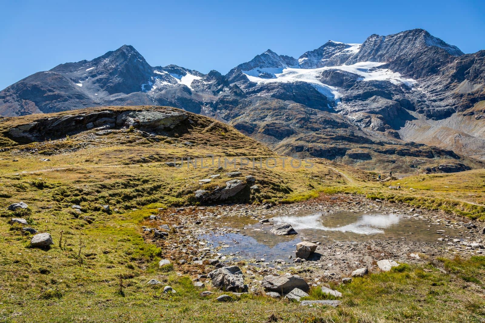 Bernina and Palu mountain range with lake in the Swiss Alps, Engadine, Switzerland
