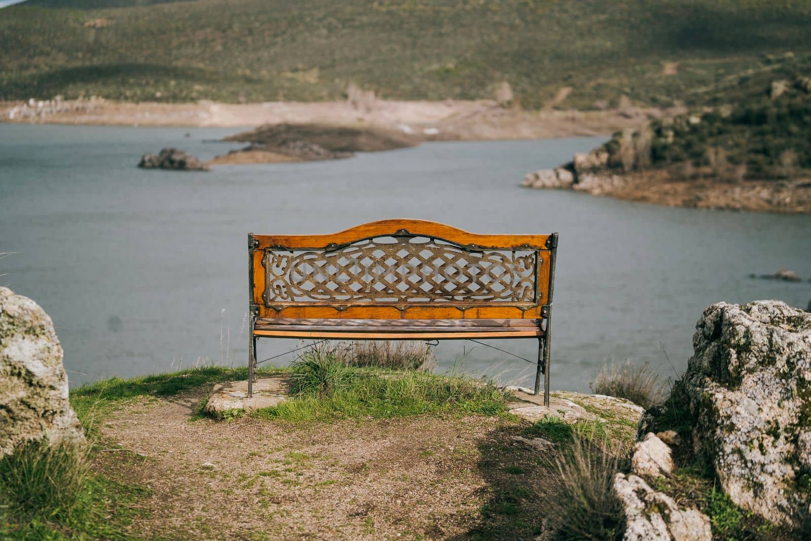 Empty vintage bench by the Ricobayo reservoir, in Zamora , Spain.