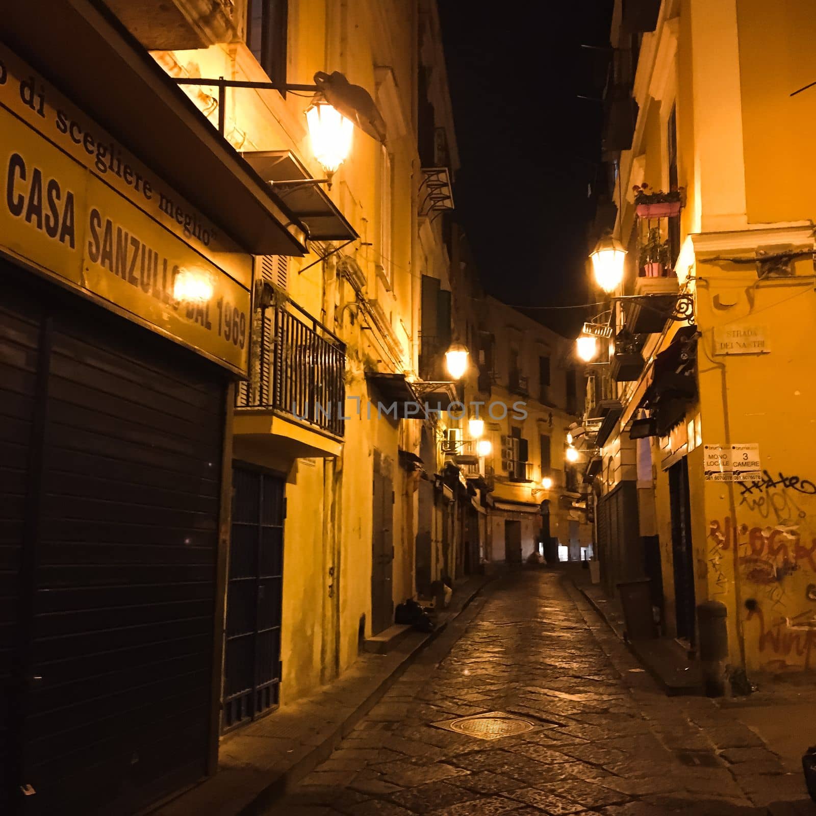 Alley in the streets of naples in the evening . High quality photo