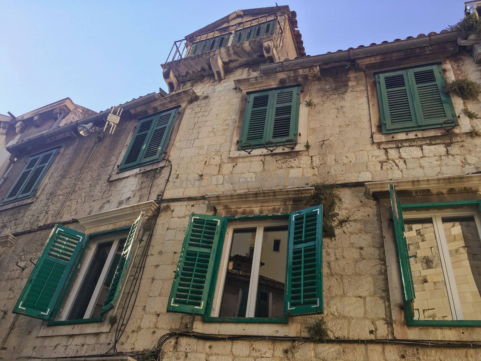 Beach views over the city of downtown Split in Croatia during the summer months in europe by WeWander