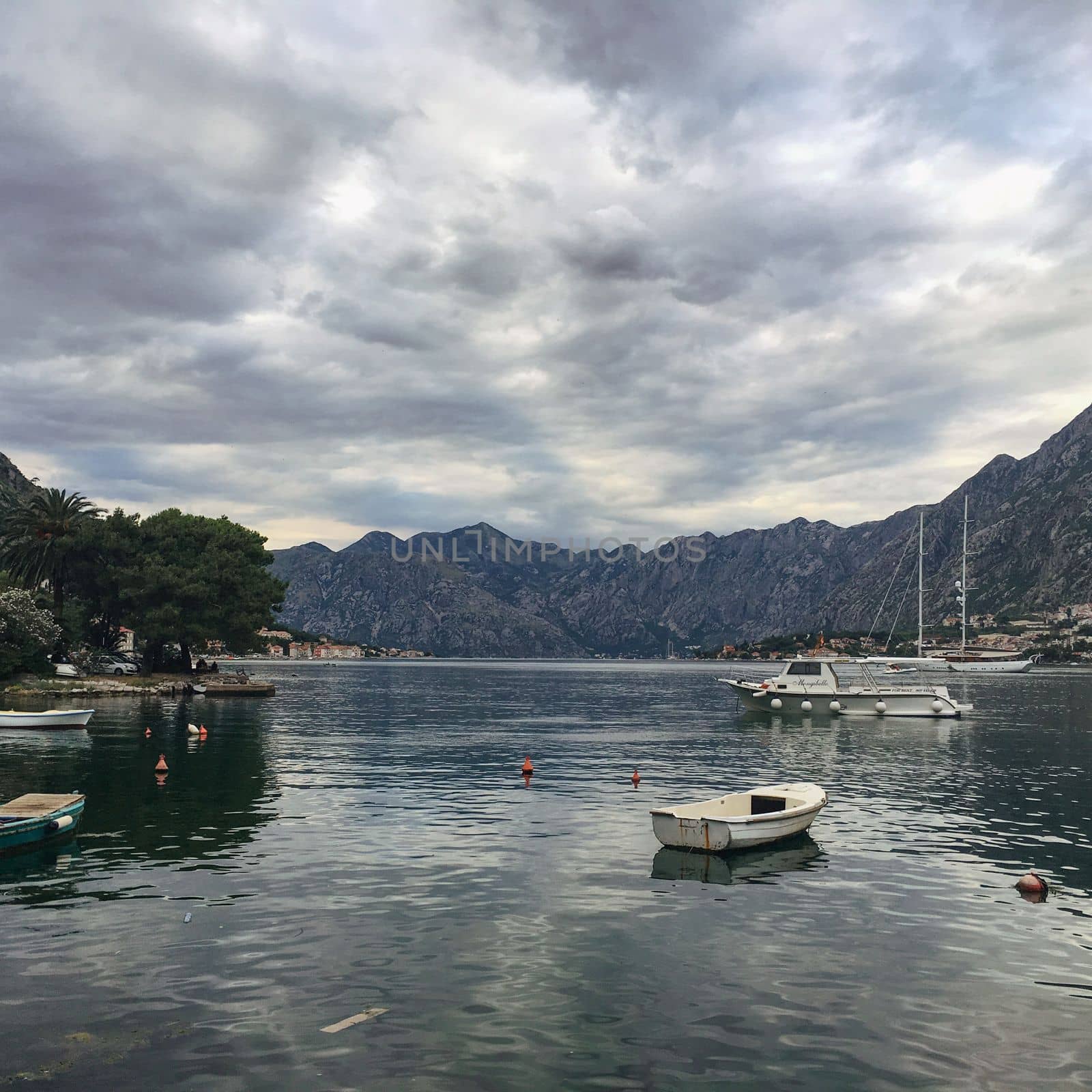 Views overlooking the city streets and waterfront of Kotor Montenegro in a european summer by WeWander