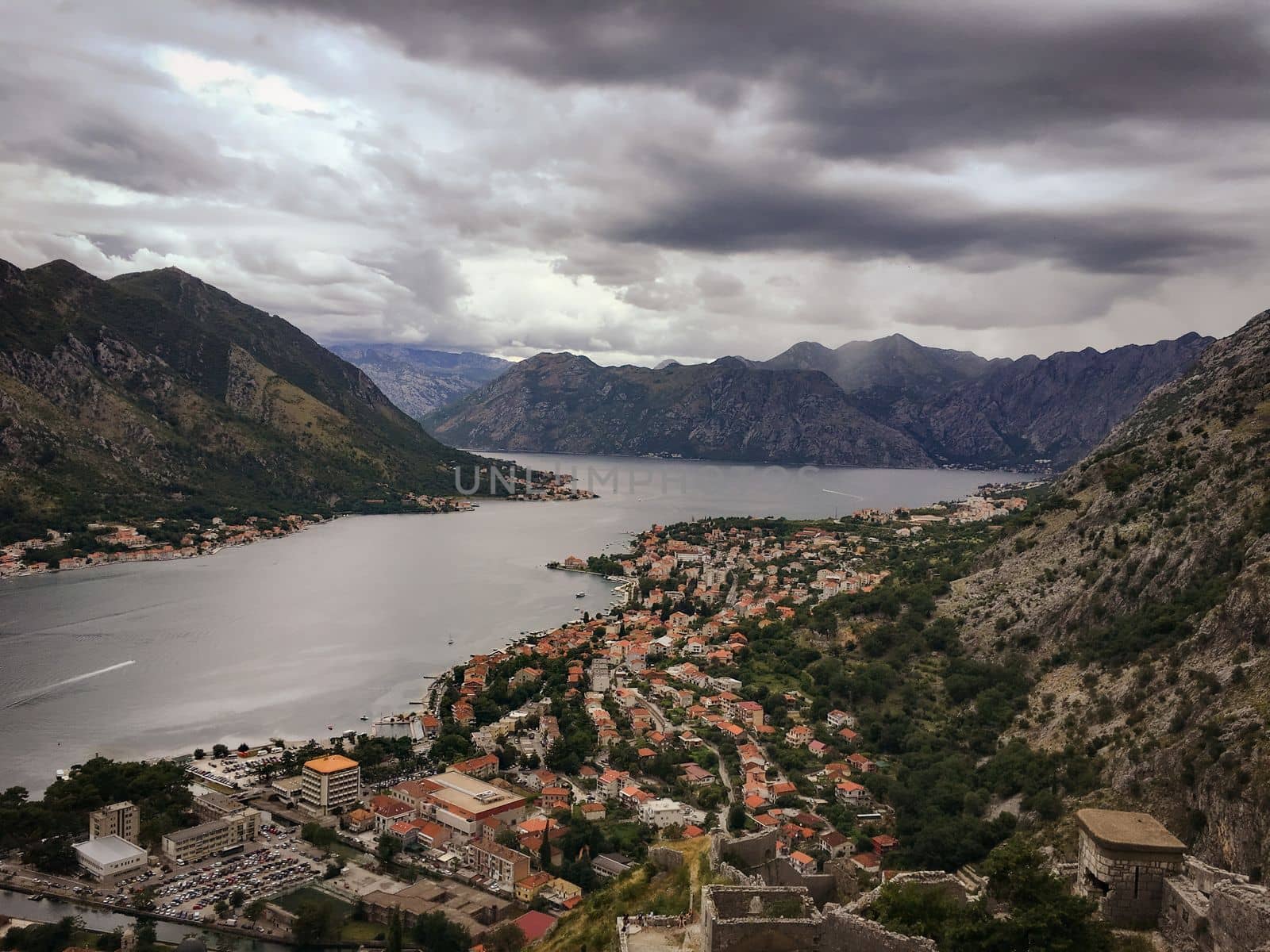 Views overlooking the city streets and waterfront of Kotor Montenegro in a european summer by WeWander