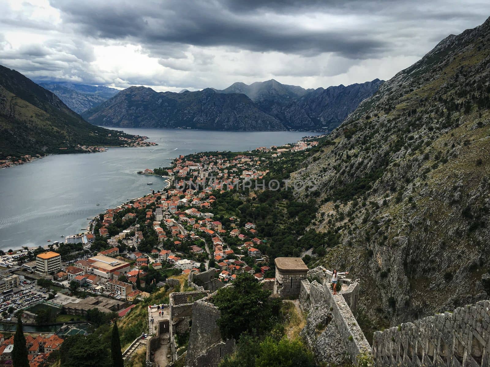 Views overlooking the city streets and waterfront of Kotor Montenegro in a european summer by WeWander