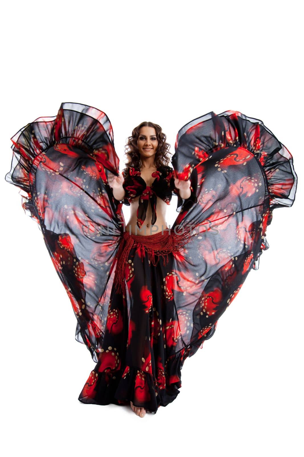 Woman dance in gypsy red and black costume isolated