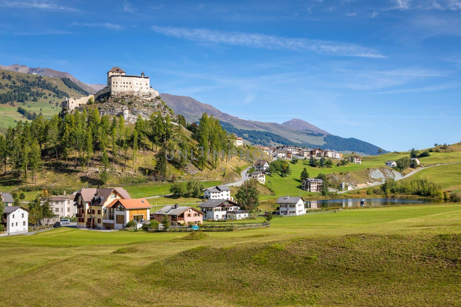 Idyllic landscape of Scuol Tarasp village at sunrise, Engadine, Swiss Alps, Switzerland