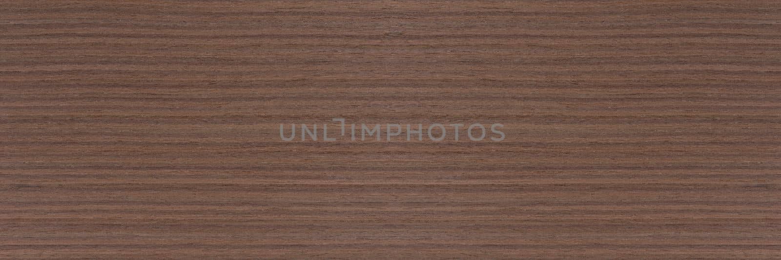 Dark brown walnut wood texture, natural wood pattern for making furniture, parquet or doors. Top view of natural veneer