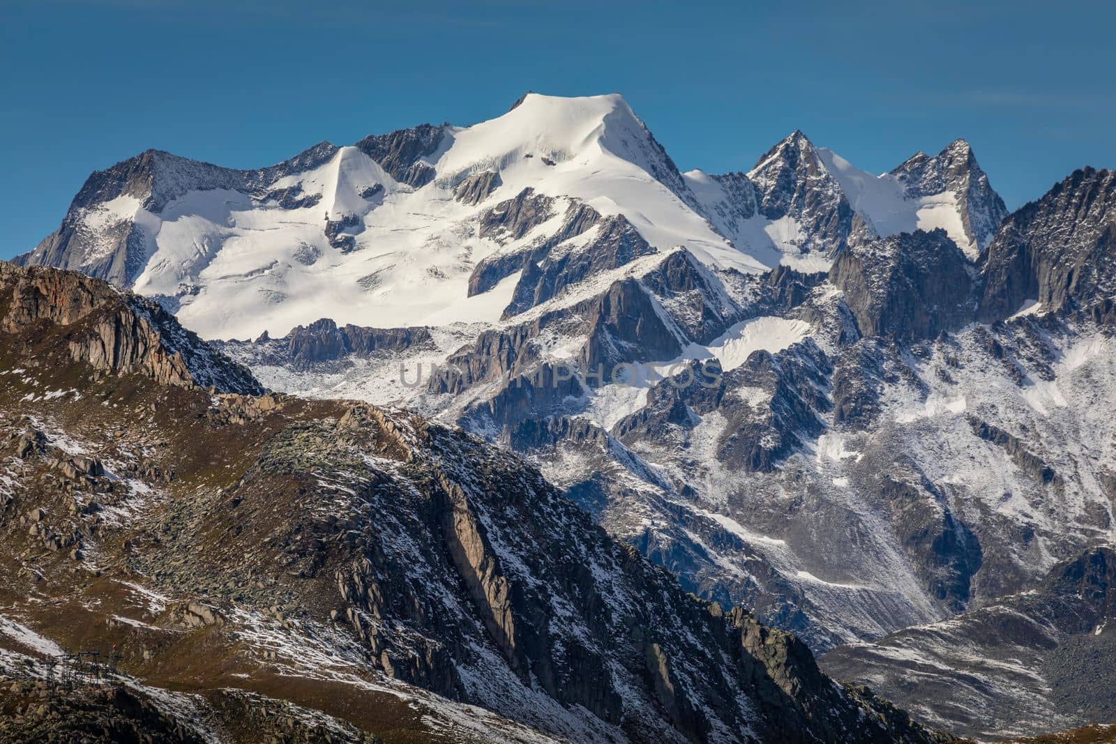 Dramatic snowcapped Bernese swiss alps seen from Nufenen Pass, Switzerland