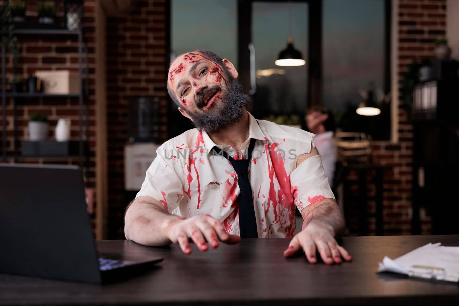 Portrait of dangerous zombie man at desk by DCStudio