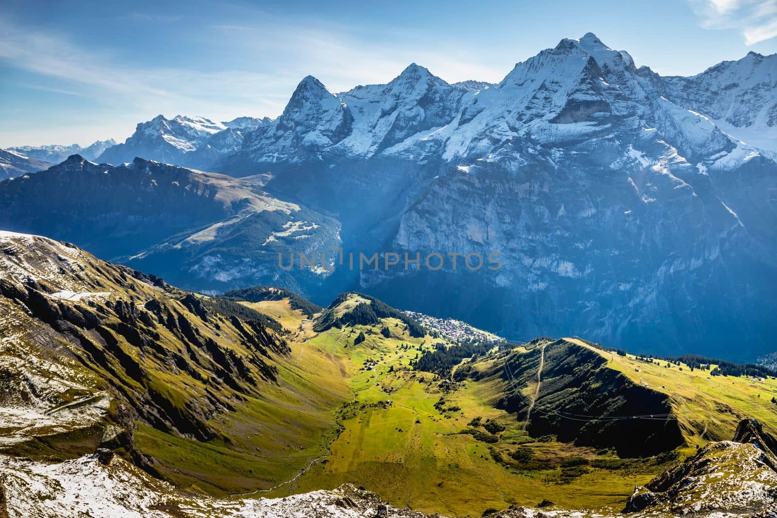 Top of the Schilthorn and view of Snowcapped Bernese Swiss alps, panorama of Eiger, Monch and Jungfrau, Switzerland