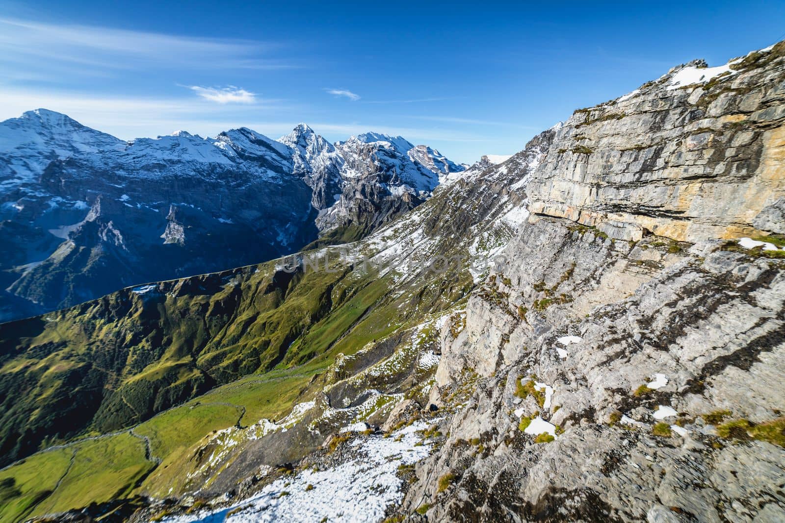 Top of the Schilthorn and view of Snowcapped Bernese Swiss alps, panorama of Eiger, Monch and Jungfrau, Switzerland