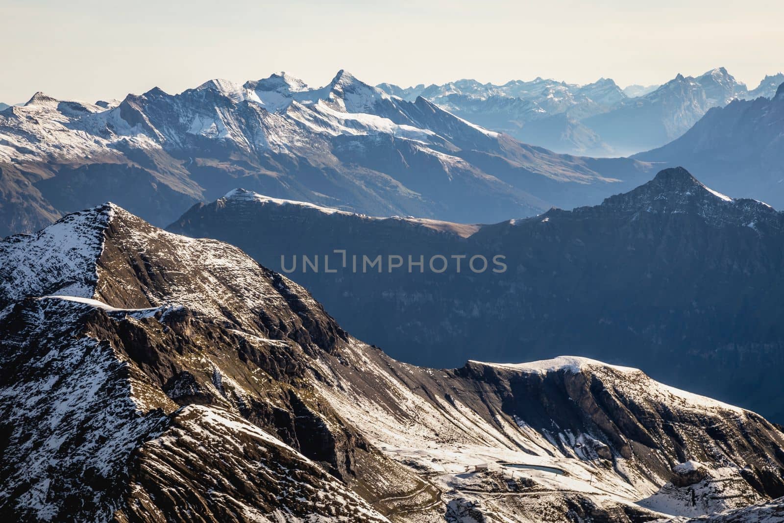 Top of the Schilthorn and view of Snowcapped Bernese Swiss alps, panorama of Eiger, Monch and Jungfrau, Switzerland