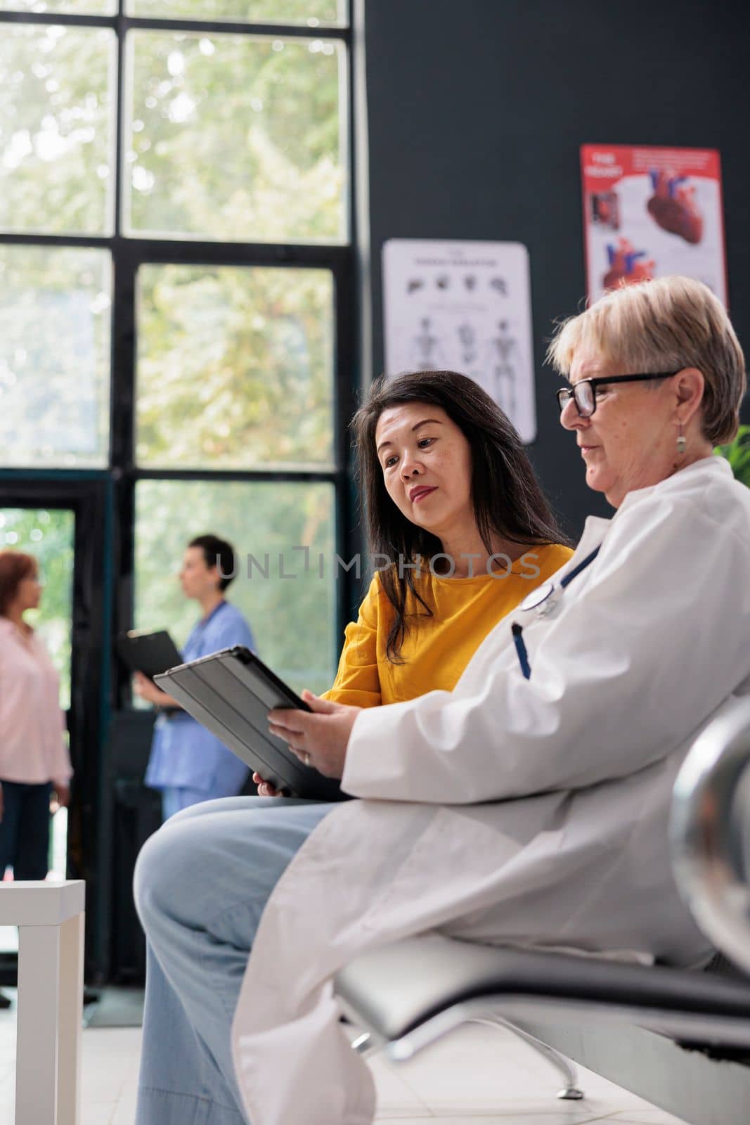 Diverse senior women attending consultation appointment by DCStudio