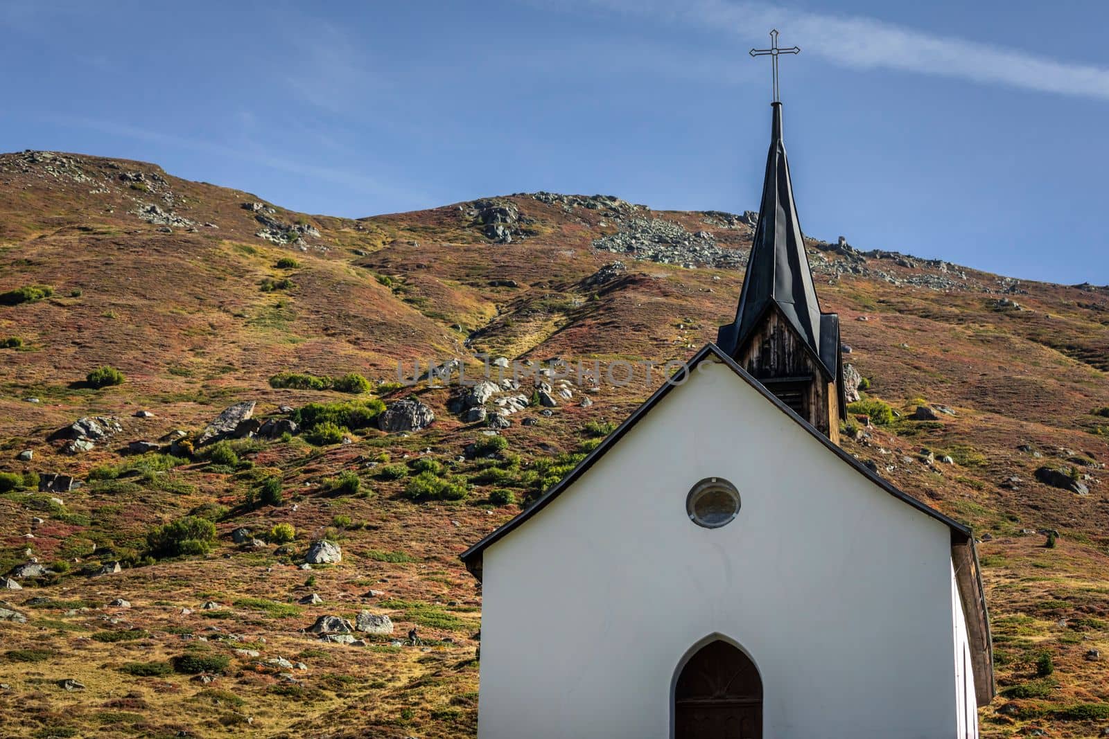 Idyllic landscape of a church at sunrise, Engadine, Swiss Alps, Switzerland