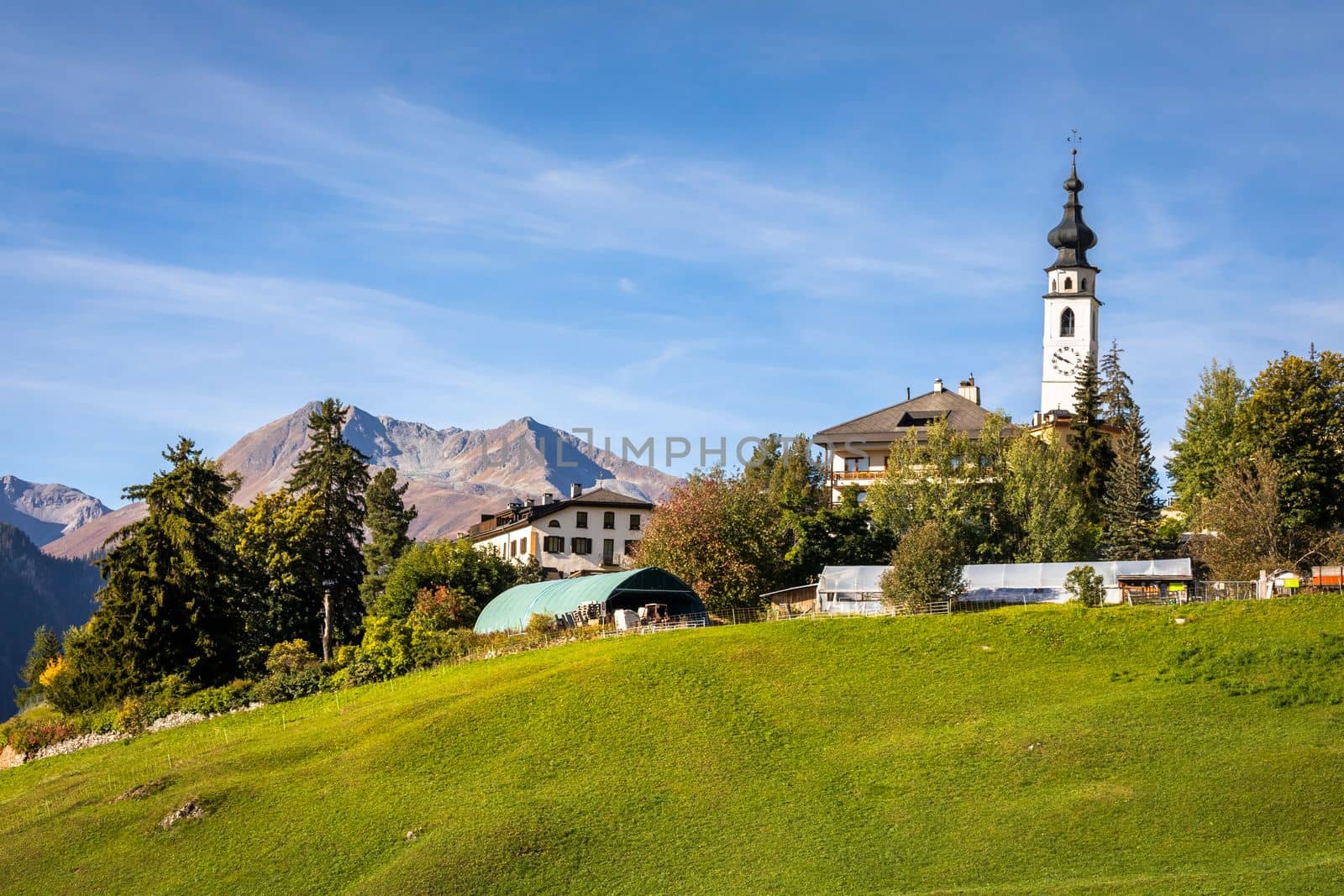 Idyllic landscape of Ftan village at sunset, Engadine, Swiss Alps, Switzerland