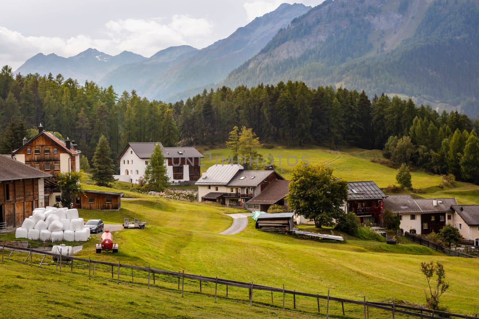 Idyllic landscape of Scuol Tarasp village at sunrise, Engadine, Swiss Alps, Switzerland
