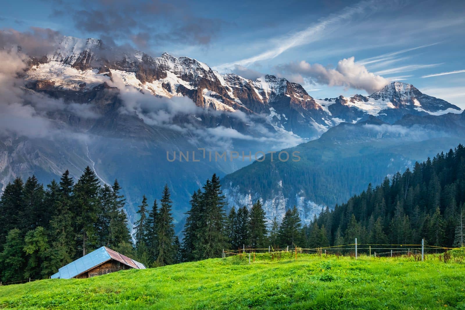 View of Snowcapped Bernese Swiss alps and Murren village, Switzerland