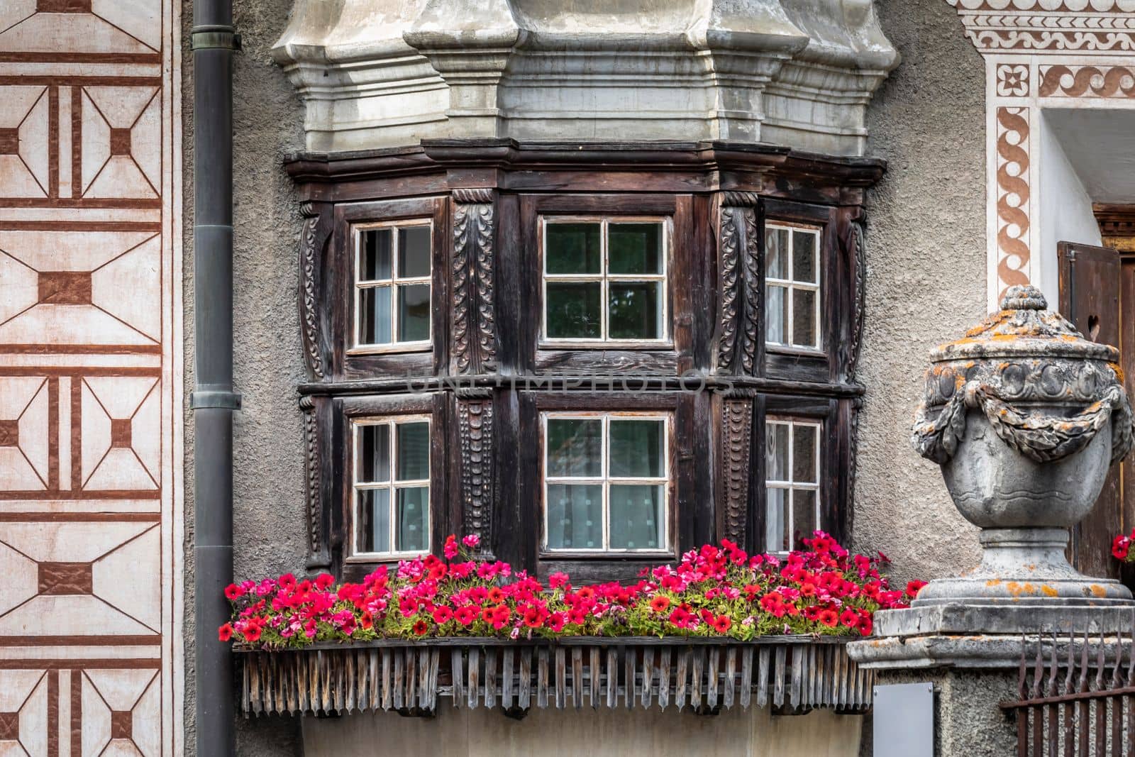 Typical Window with Balcony in Engadine swiss alps, Graubunden, Switzerland