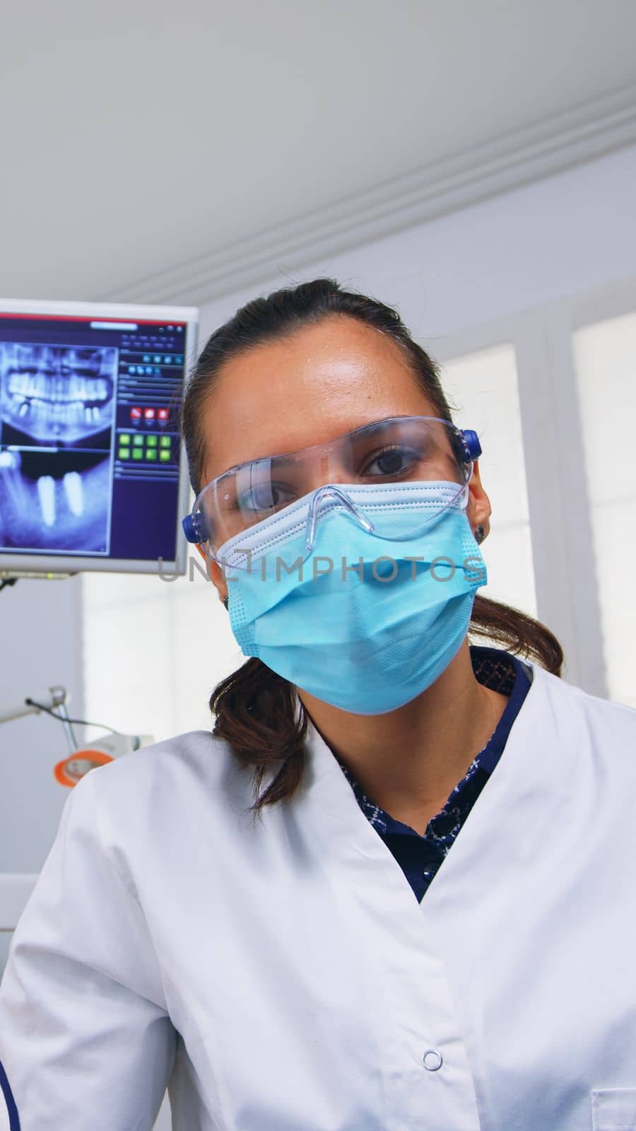 Pov of dentist working on patient mouth hygine by DCStudio