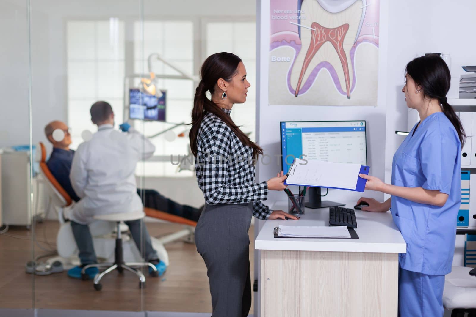 Patients in stomatology reception waiting in line by DCStudio