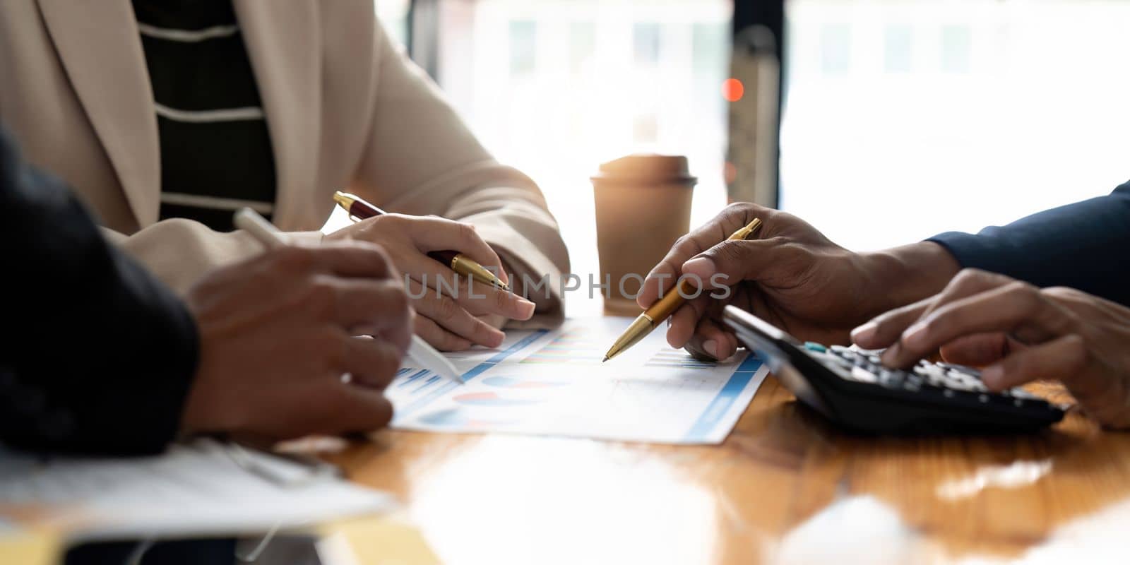 Accounting fund managers meeting to planning to improve quality next year team consultation investment stock market analysis and checking paperwork on workplace