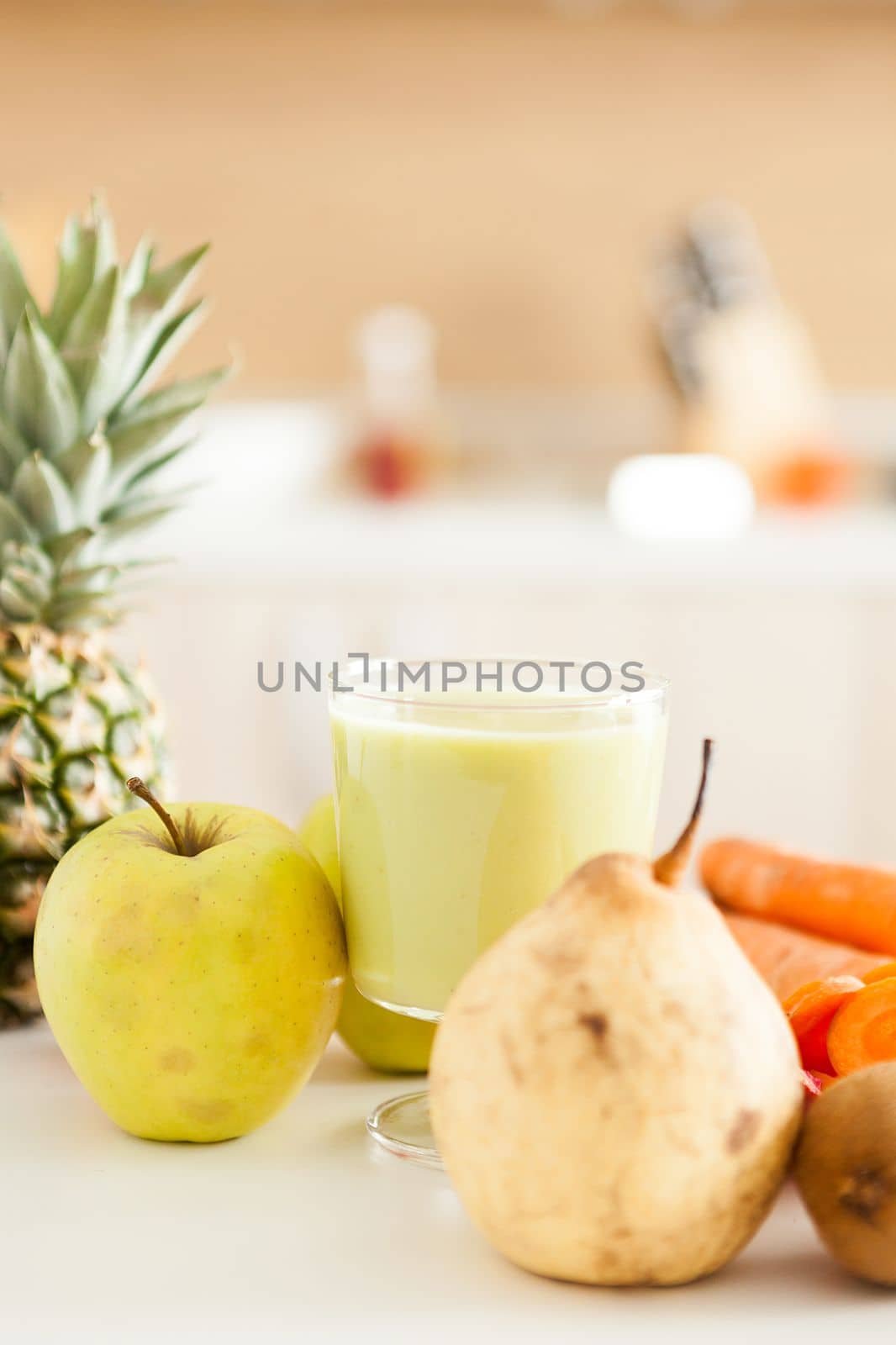 Fresh fruits, vegetables and smoothies in the home kitchen