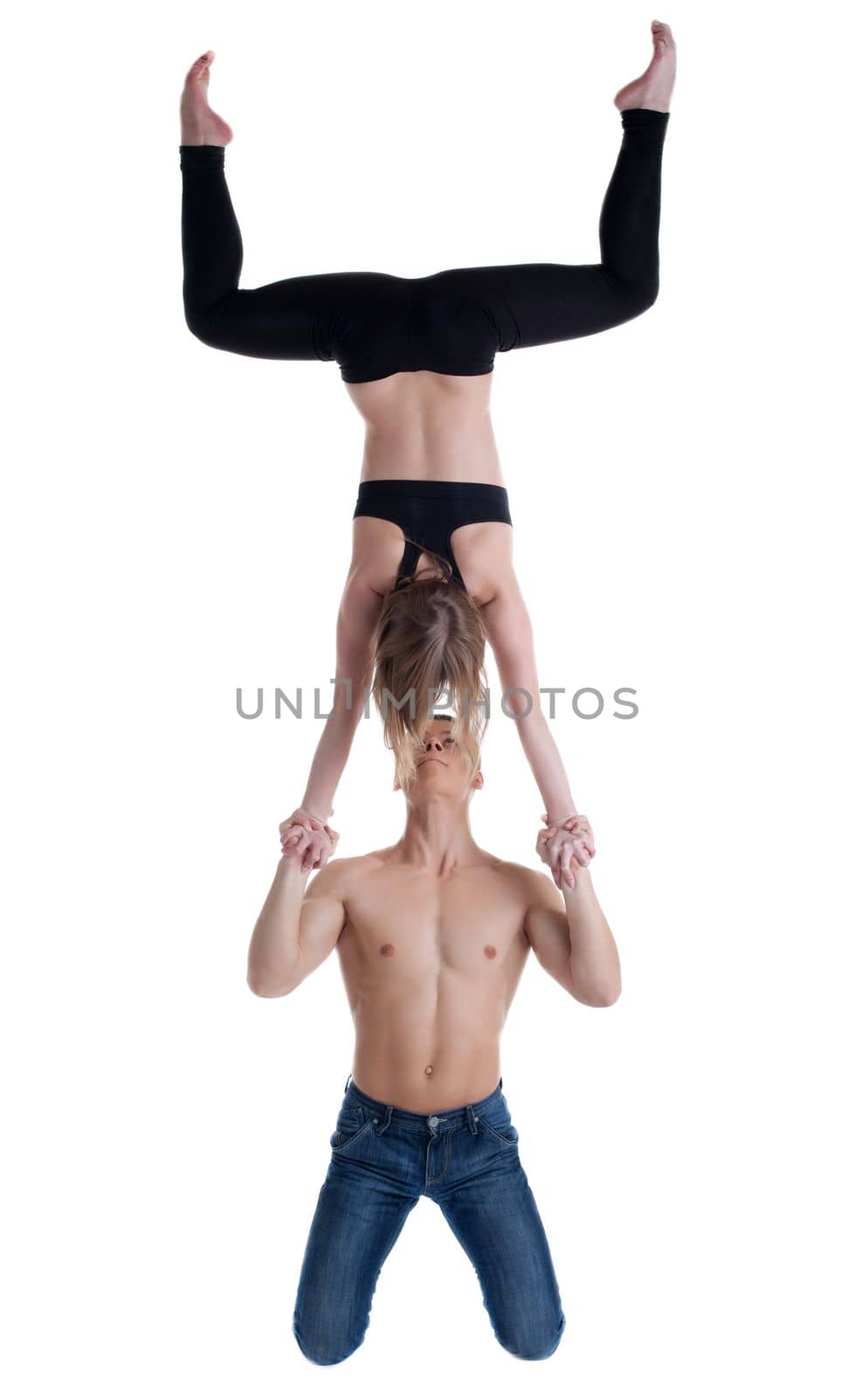 two young acrobats show high skill stand on hand isolated