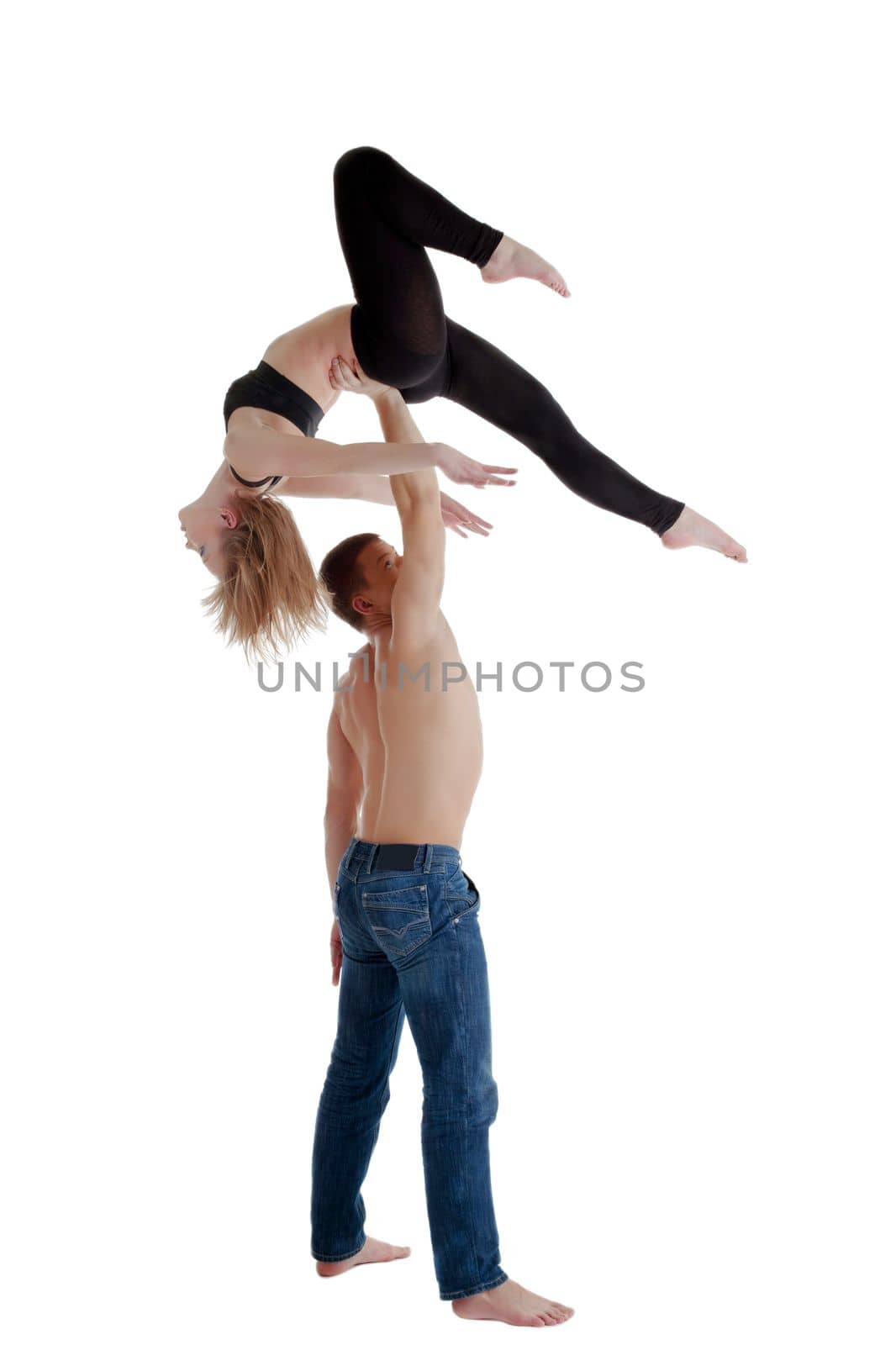 Couple of young gymnast show acrobatic performance isolated