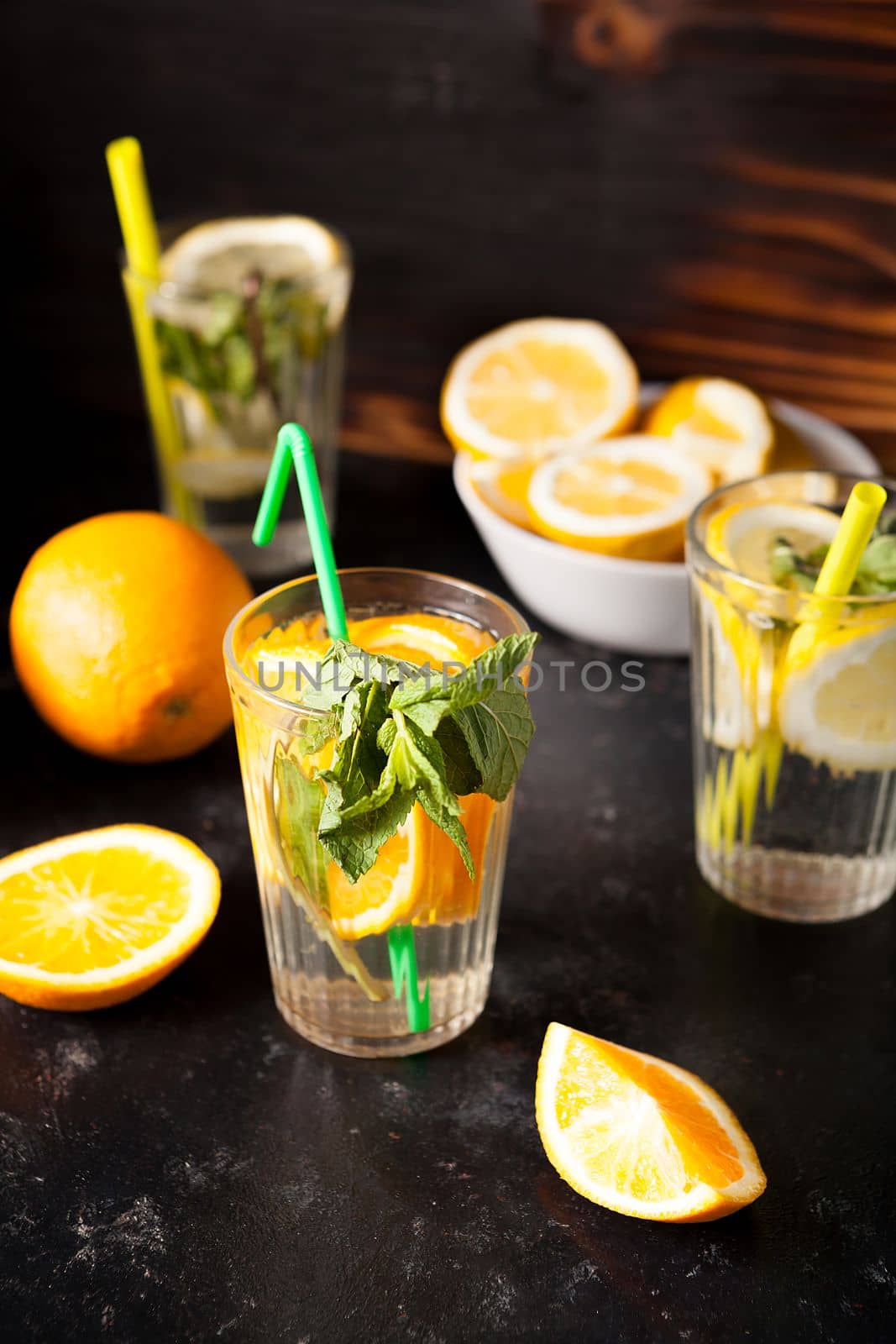Healthy and delicous detox water made of lemons and oranges by DCStudio