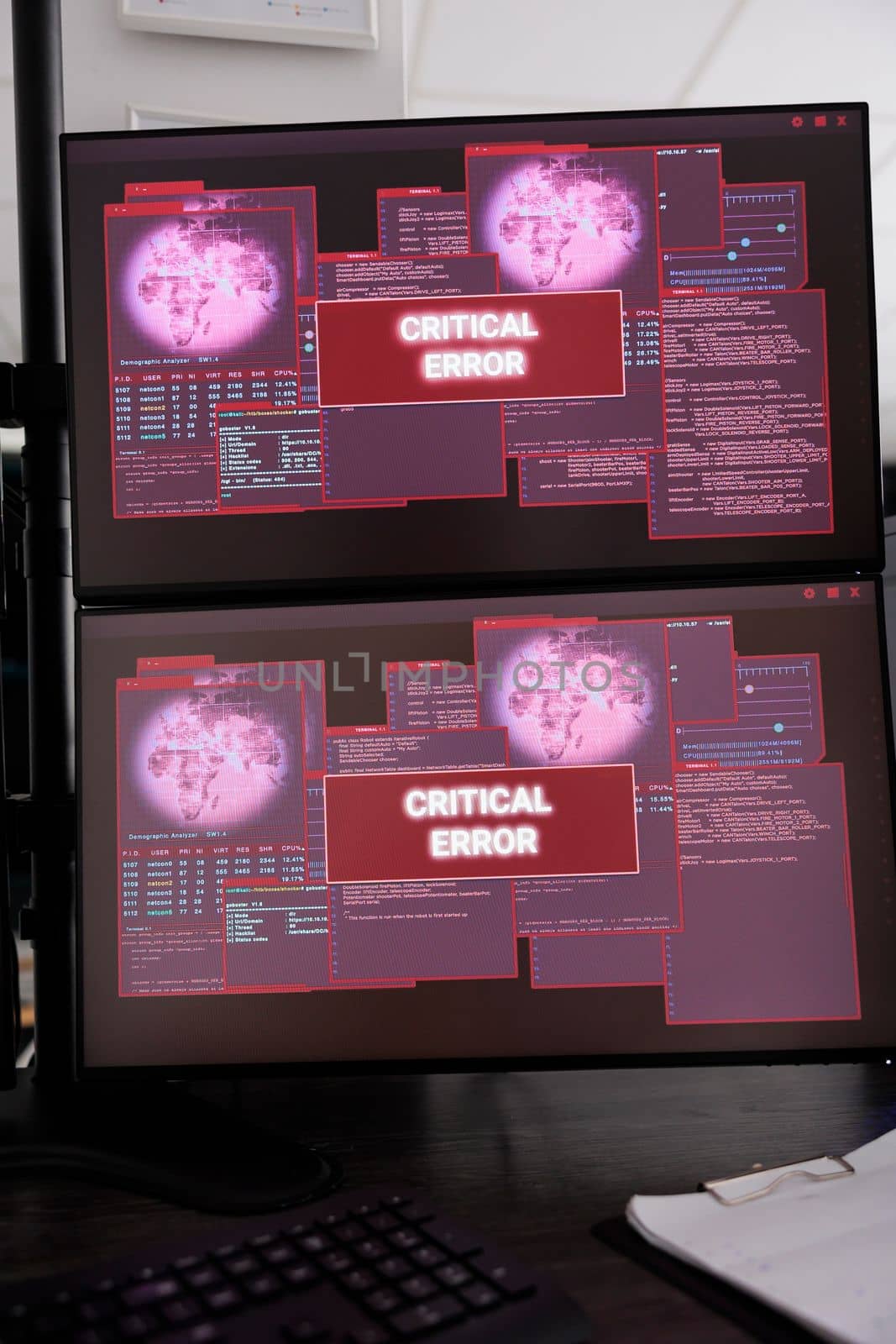 Empty data room with multiple monitors showing hacking attack alert by DCStudio