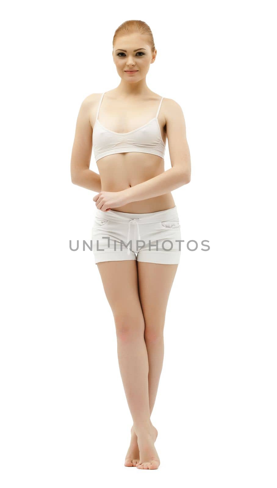 Beauty young woman training in white dress on white isolated