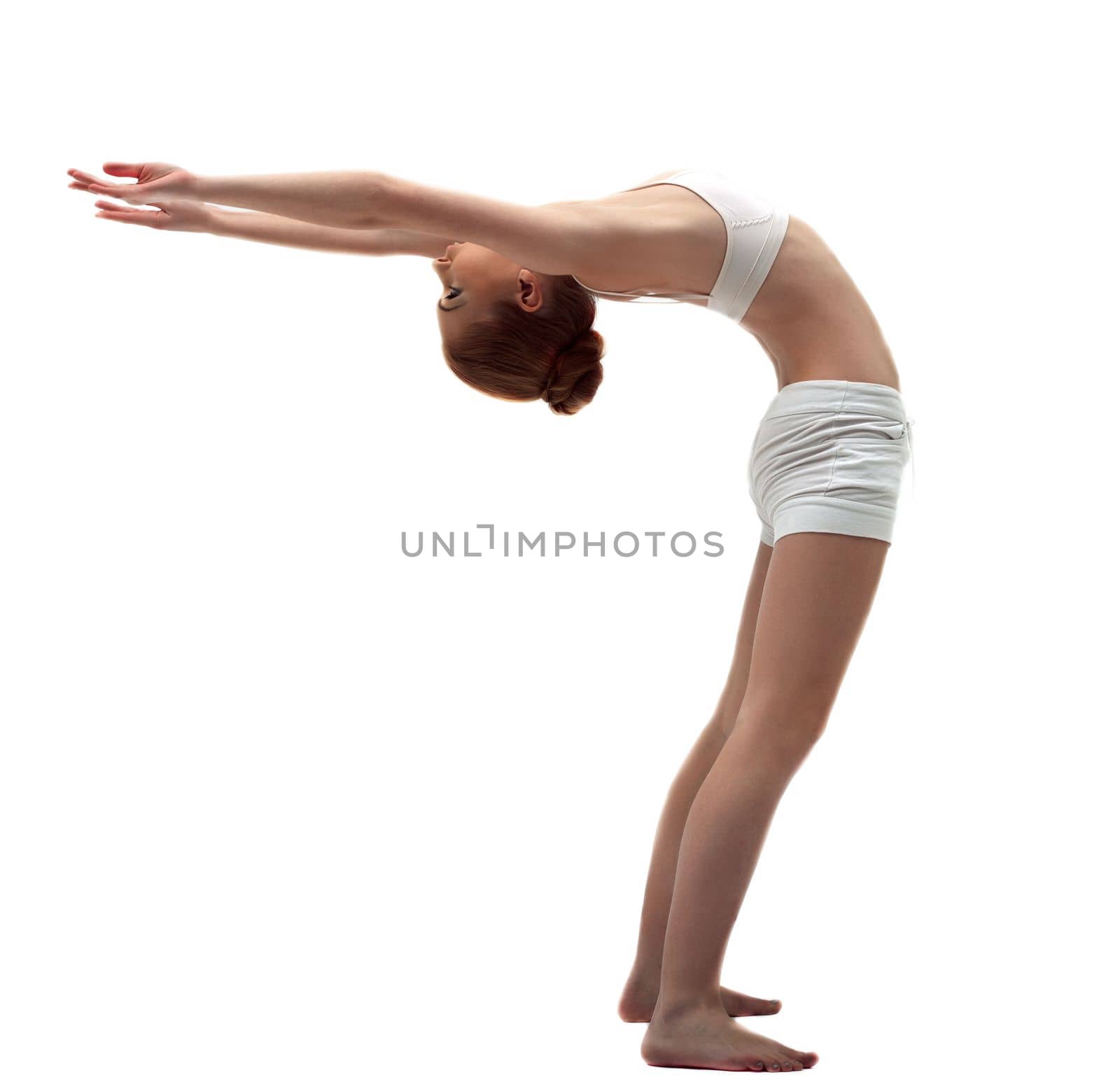 Young gymnast in white training costume on white isolated