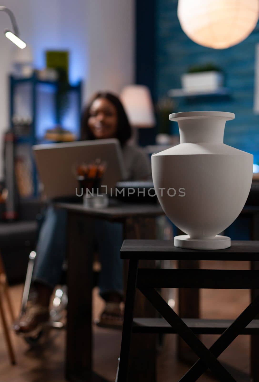 African american creating vase digital artwork on computer by DCStudio