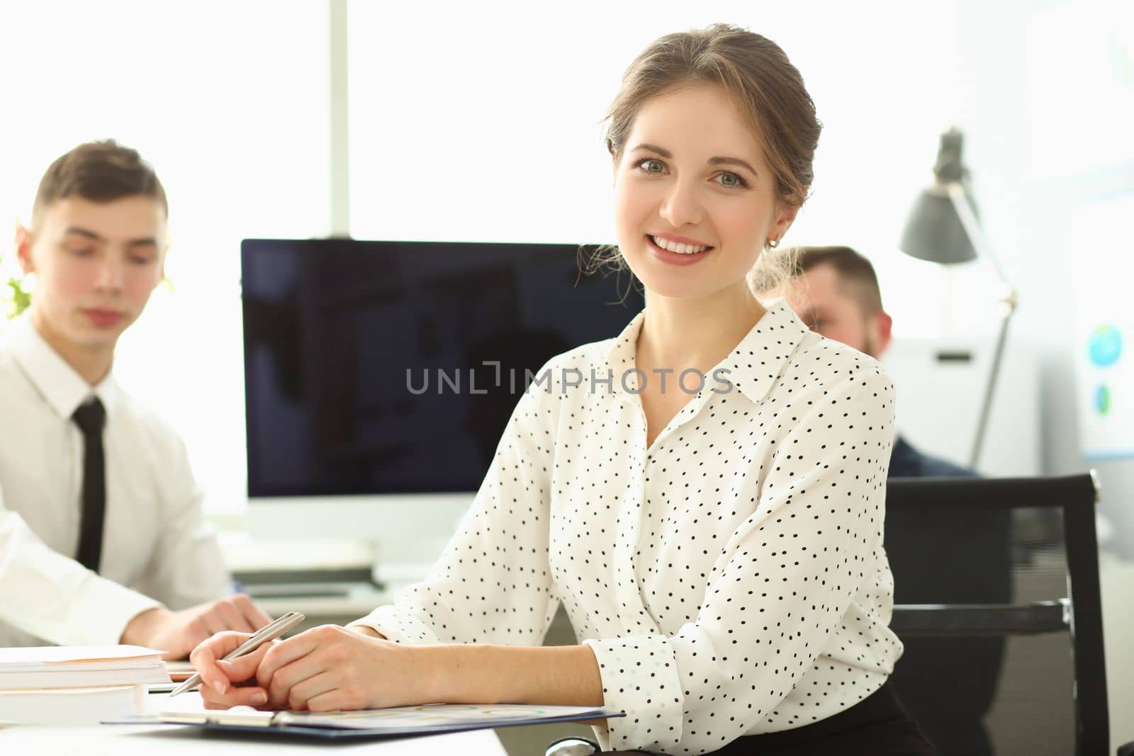 Business people sit and work focus on beautiful woman by kuprevich