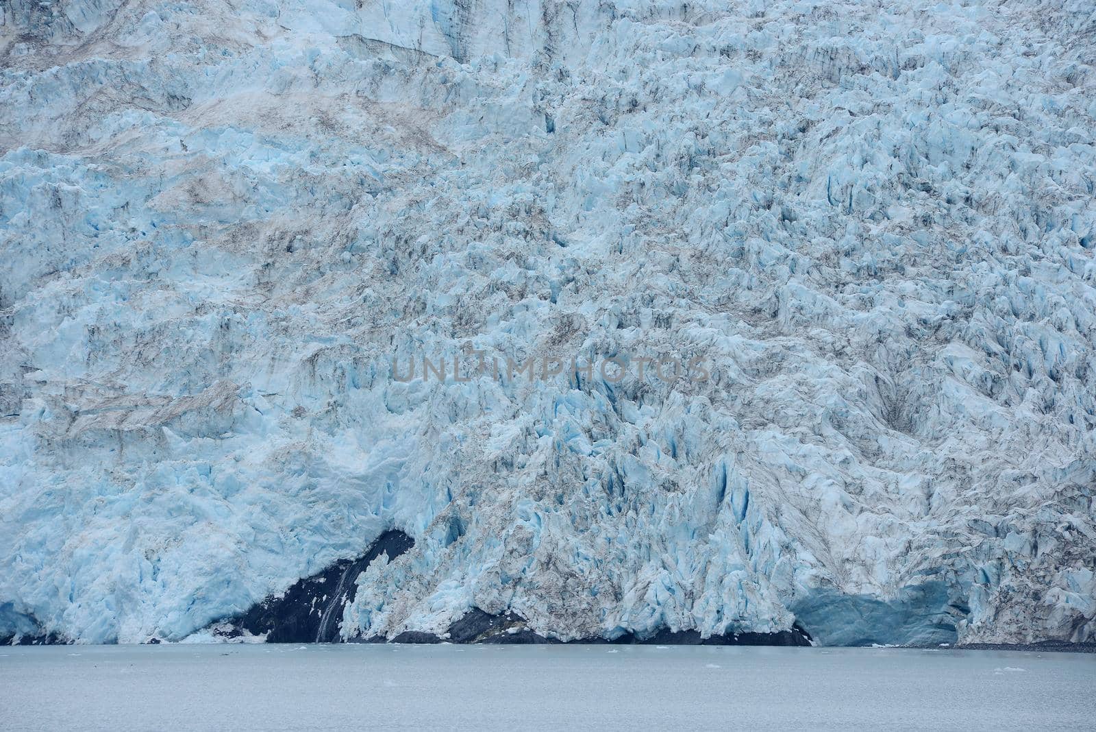 blue color of tidewater glacier in prince william sound in alaska