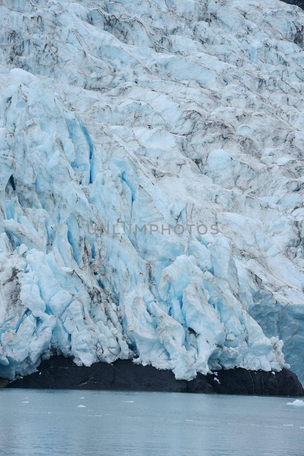 blue color of tidewater glacier in prince william sound in alaska