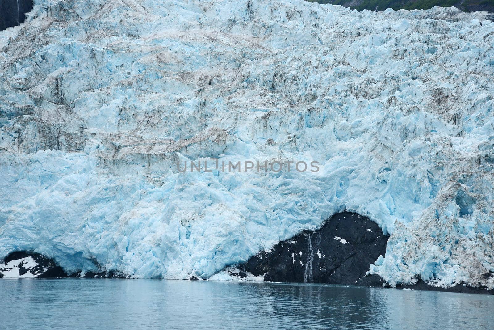 blue color of tidewater glacier in prince william sound in alaska